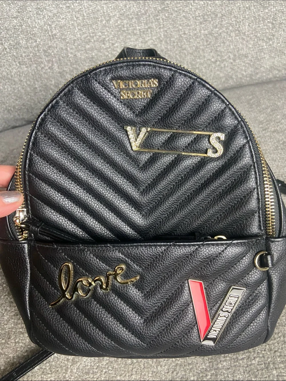 Victoria's Secret Black Quilted Mini Backpack with Gold Accents and Red Detail